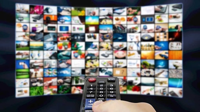 remote points at many tv screens